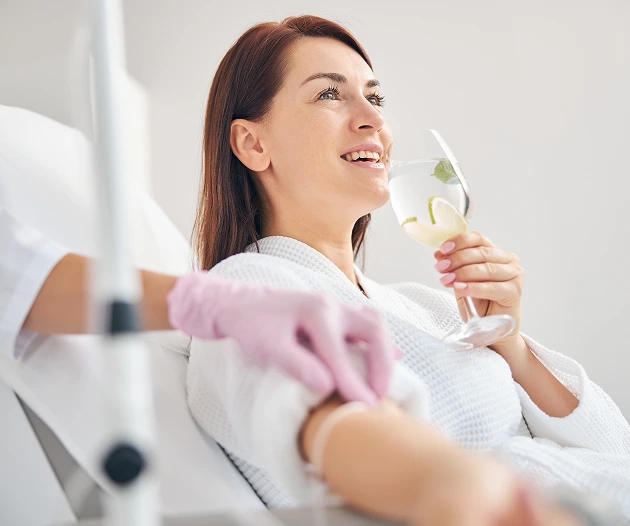 Woman receiving IV drip