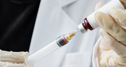 Doctor preparing injection
