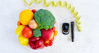 Fruit, glucometer, and tape