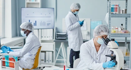 Researchers working in laboratory