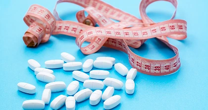 Weight Loss Pills & Measuring Tape