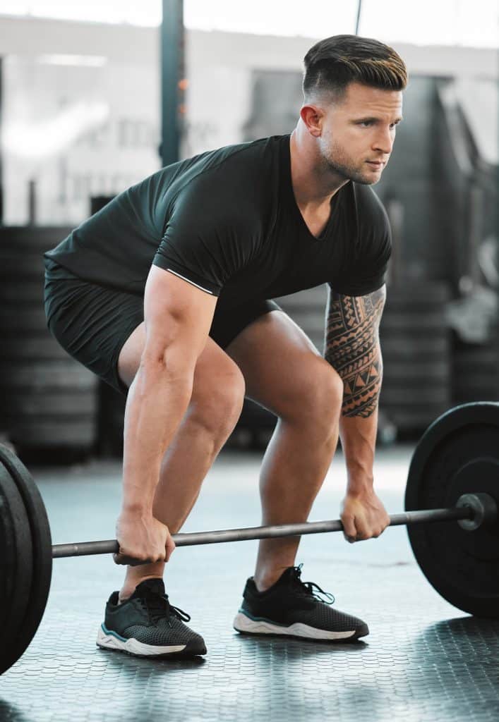 fit active and strong man with barbell weight for 2025 04 06 07 42 28 utc